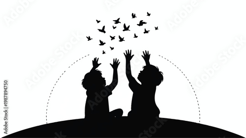Two children releasing birds into the air with joyful hands up