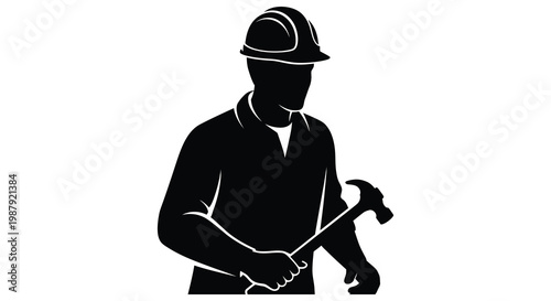 Construction worker with helmet and hammer a striking silhouette