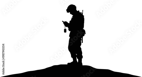 Soldier Silhouette Using Mobile Phone on Hilltop