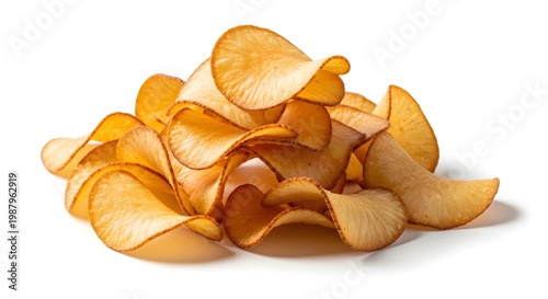 Pile of golden cassava chips isolated on a white background