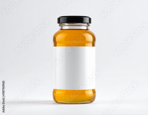 Pure Golden Honey in Glass Jar with Fresh Honeycomb and Gold Lid Isolated on Dark Gradient Background