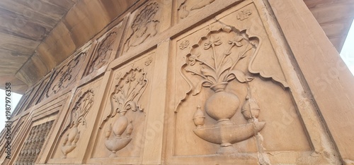 Intricate Floral Stone Carvings on the Sandstone Walls of Sheikh Chilli Tomb in Kurukshetra India