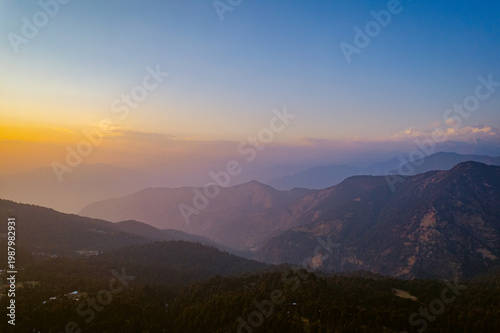 Canvas Print A serene mountain landscape at sunset near Tungnath temple, Uttarakhand, India