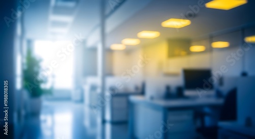 Blurred interior office scene with glass doors and warm lighting creates a modern and abstract atmosphere