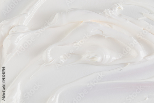 Delicate swirls of vanilla cream to decorate pastries. The texture of creamy pastry cream. Copy of the space. texture sample. selective focus