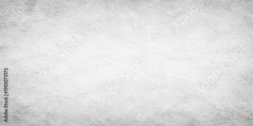 A vintage blank page features a dark grunge paper texture with a rough grey stone surface and old white canvas material for a dirty textured backdrop design