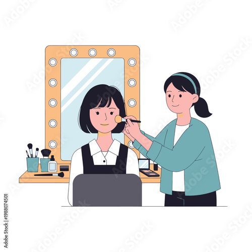Makeup artist applying blush to a woman's face in front of a lighted mirror