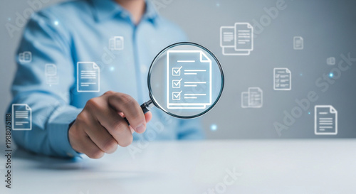 Business professional analyzing document trends with magnifying glass and digital icons