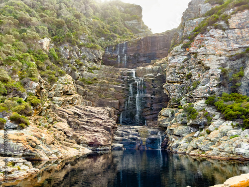 Scenic view of a coastal waterfall
