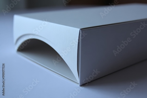 Elegant white box with curved lid for packaging or storage purposes