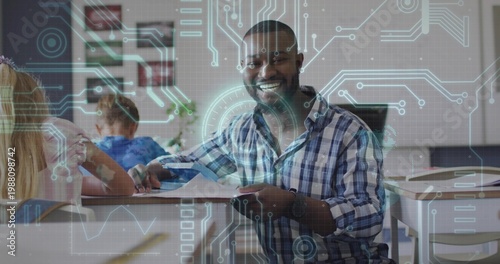 Billede på lærred Smiling teacher in blue shirt holding paper and phone guiding students in class