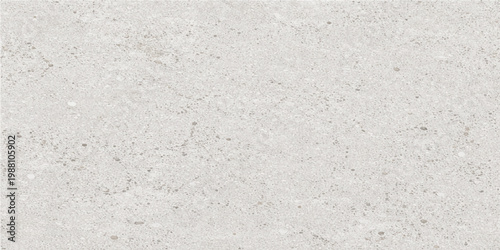 Textured tile presents a light-toned surface. This minimalist design emphasizes the raw beauty of the natural materials, suitable for backgrounds or surface treatments.