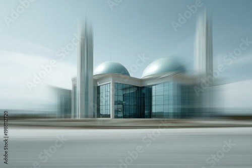 Modern architectural building with domes and towers is blurred.