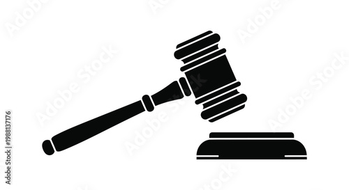A black gavel and sounding block are shown in stark contrast silhouette