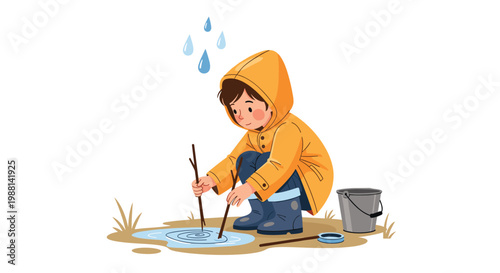 Young child in a yellow raincoat and boots playing happily with sticks in a rainwater puddle on a cloudy and rainy day.