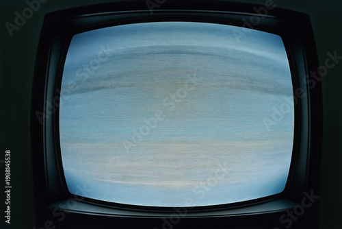 Vintage tv showing static noise with retro vibes and abstract blue tones
