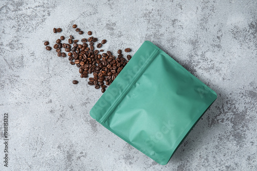 Green coffee bag with beans...