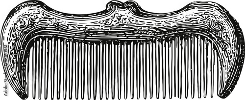 Ornate vintage comb with intricate decorative handle design, grooming accessory for hair care