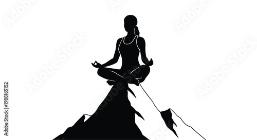 Serene woman meditating in lotus position on mountain peak with majestic landscape silhouette, peaceful and spiritual, yoga and wellness concept