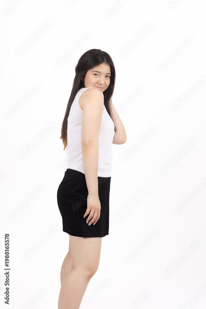 Fototapeta premium Young woman in casual clothes posing and looking away