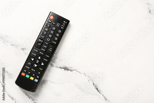 Modern TV remote control on...