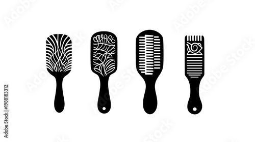 Four black-and-white stylized hair tools, each with a unique decorative design, on a white backdrop