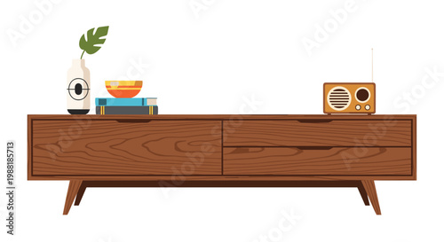 An elegant low-profile wooden media console features a vintage brown radio alongside a stack of colorful books and a patterned ceramic bowl on top in a bright space.