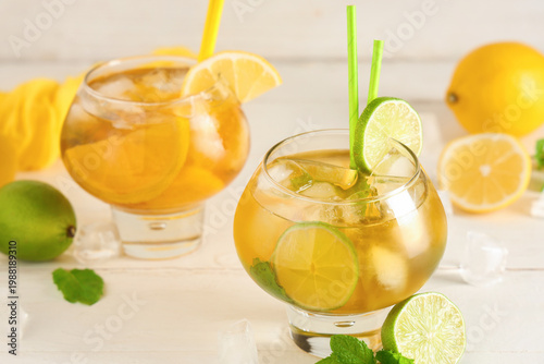 Glasses of cold tea with ci...