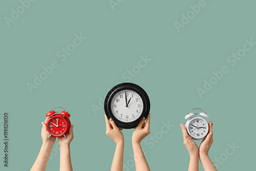 Female hands holding differ...