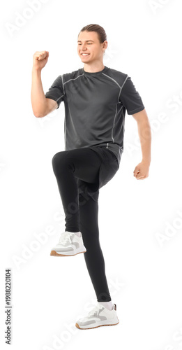 Sporty young man running on...
