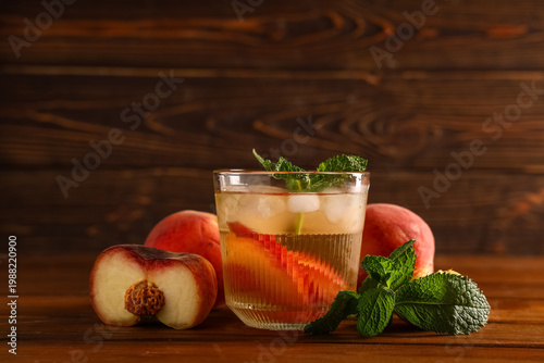 Glass of fresh peach lemona...