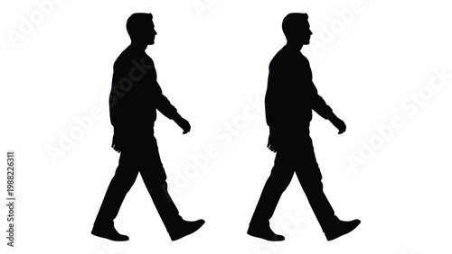 Two silhouetted figures of men walking in the same direction viewed from the side