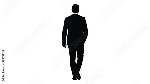 A silhouetted figure of a man in a suit walking away from the viewer