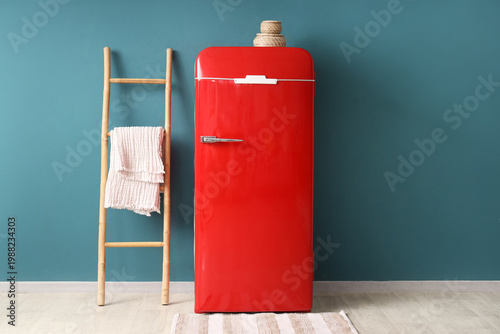 Modern red refrigerator and...