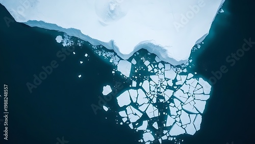 indelible. Large glacier calving into a calm sea, aerial view of ice fragments drifting apart. ESG reports, sustainability campaigns, designed for sustainability communications and ESG reporting.