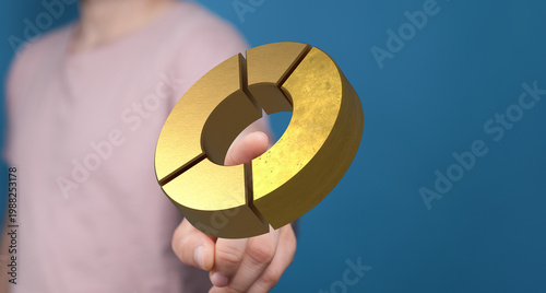 A hand holds a gold pie cha...
