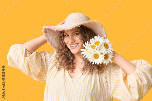 Happy young woman with bouq...