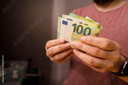 Close-up of a person holdin...