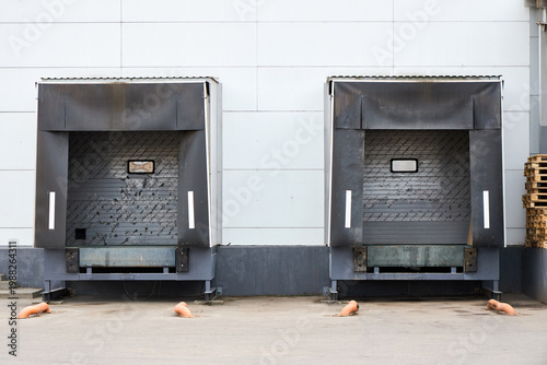 Fotografie Loading docks or loading bays with bumpers, levelers, lift, dock seals or shelters, traffic lights