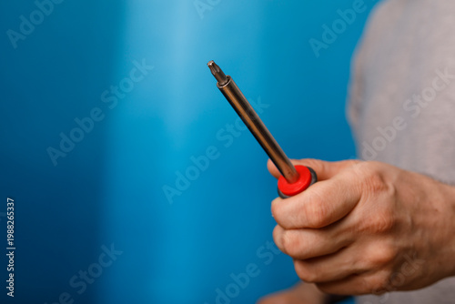 Close-up of a hand holding ...