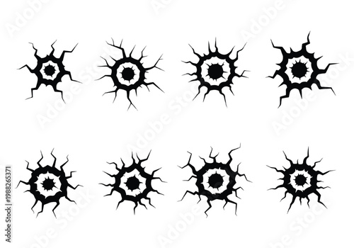 Set of Eight Black Cracked Hole Graphic Elements.