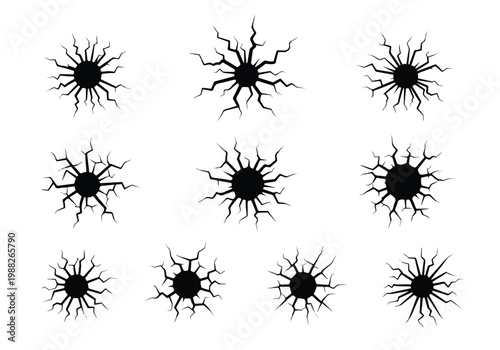 Set of Black Starburst Crack Patterns Isolated on White Background.