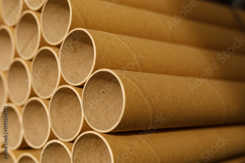 Fotografie Close-up of brown cardboard tubes in a row