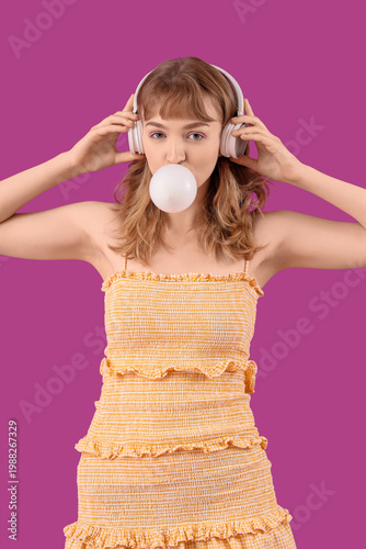 Young woman in headphones w...