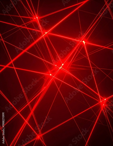 Glowing red laser beams crisscross a dark background, creating a vibrant, geometric pattern of light and shadow