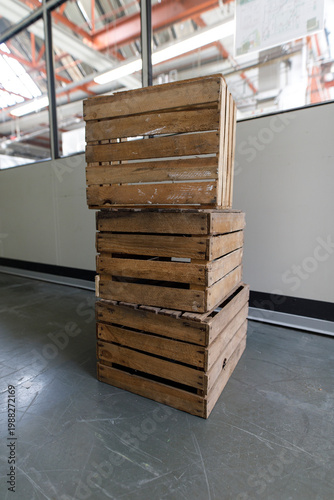 Three weathered wooden crat...