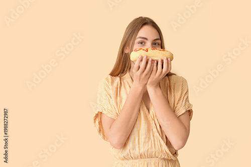 Pretty young woman with tas...