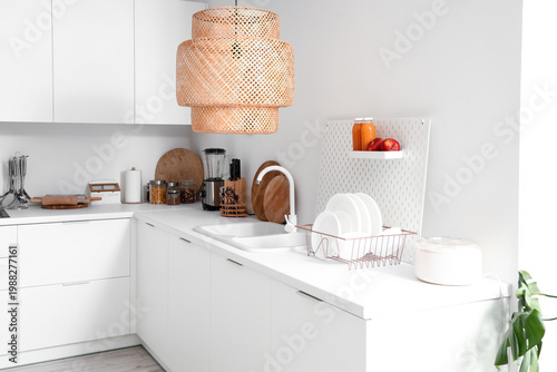 White kitchen counters with...