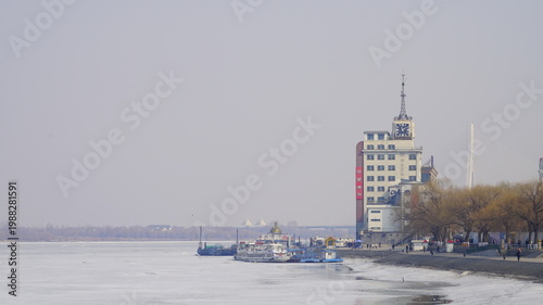 Harbin's Songhua River frozen by the cold