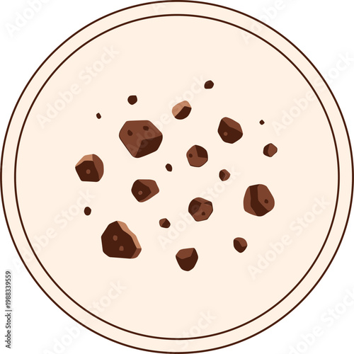 Chocolate chunks scattered on a plate with a brown outline
